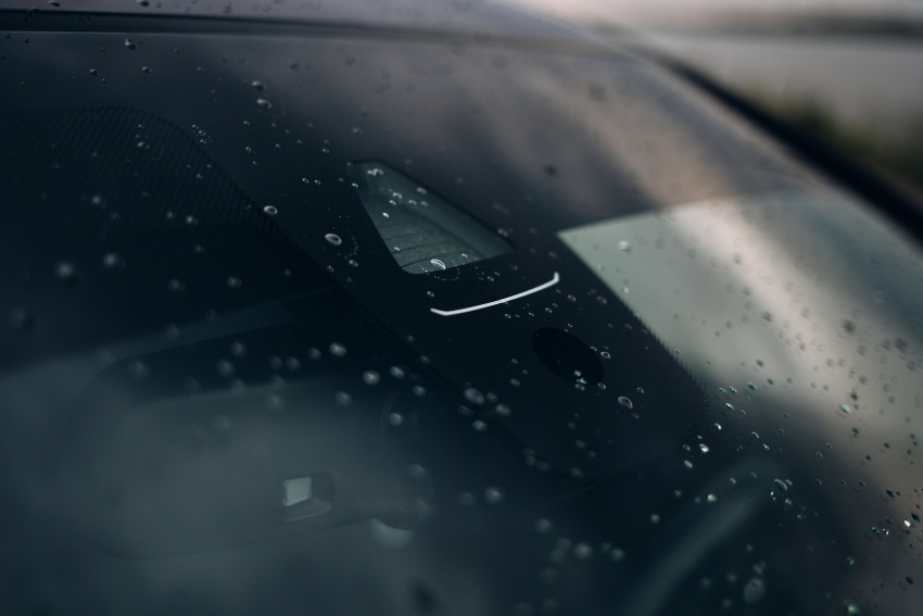 Water beading on the car showing protection film installated by Auto Salon of Orlando in Orlando, FL
